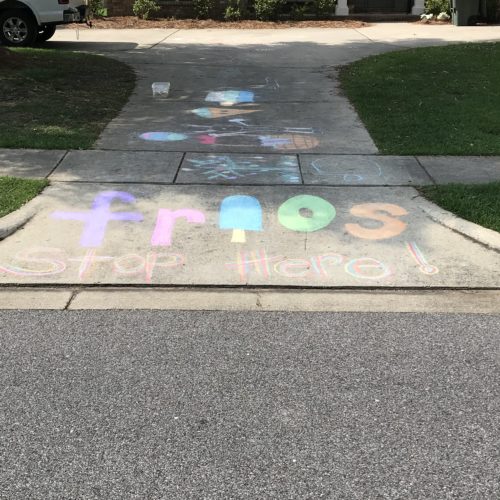 sidewalk chalk art of frios pops logo