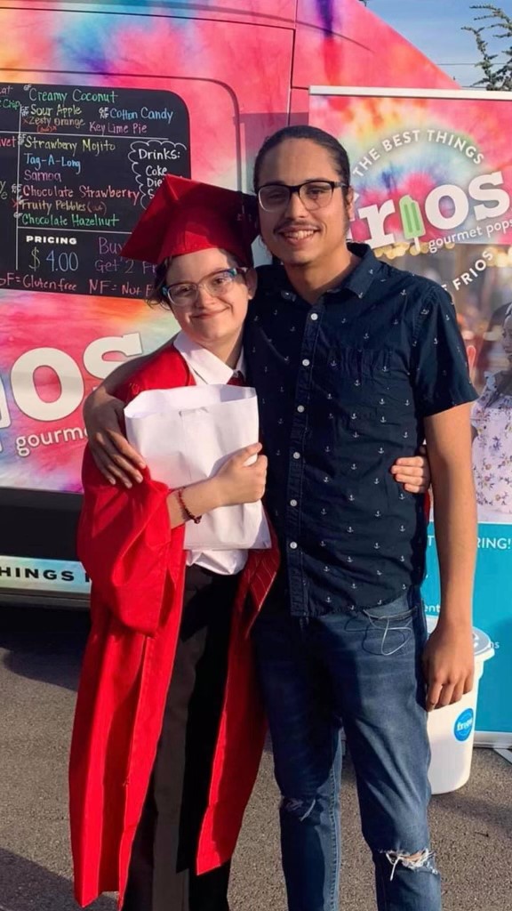 happy graduate celebrating with frios